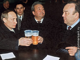 Владимир Путин и Муртаза Рахимов. Фото с сайта "Коммерсант" (с)